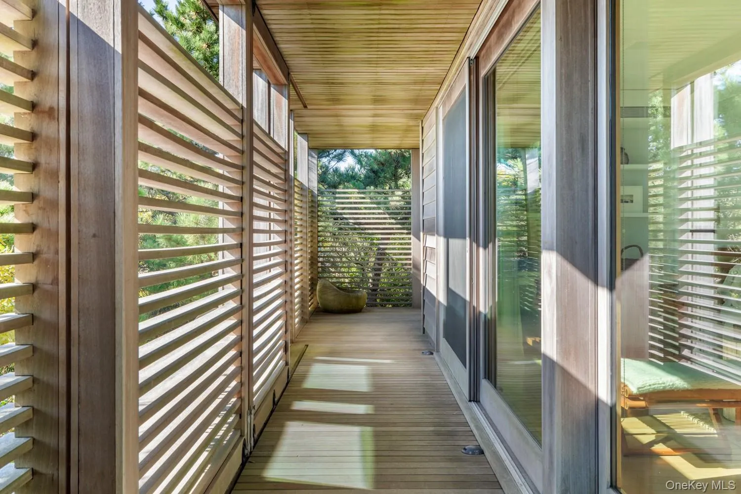 With sliding mahogoany gates to open to ocean and landscaped views With sliding mahogoany gates to open to ocean and landscaped views