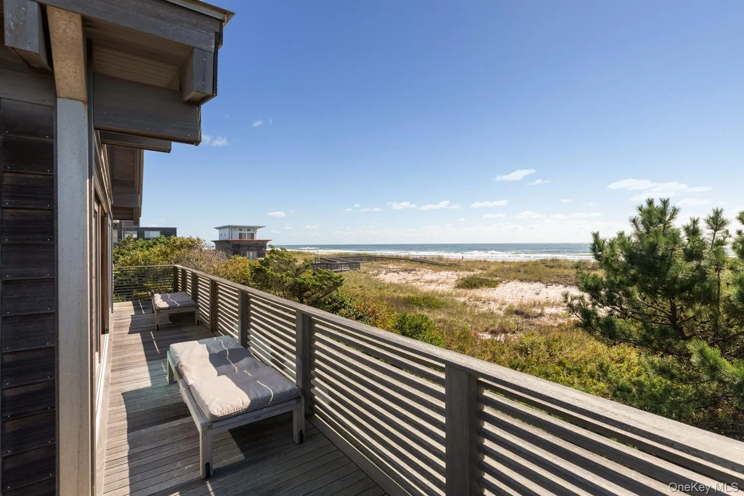 Upper deck made with 2 x 4 mahogony and custom made slats with view of the beach Upper deck made with 2 x 4 mahogony and custom made slats with view of the beach