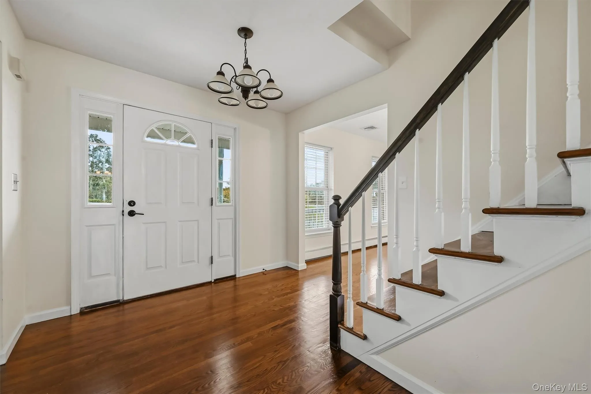 Hardwood floors and an open staircase set the tone as soon as you walk through the door. Hardwood floors and an open staircase set the tone as soon as you walk through the door.