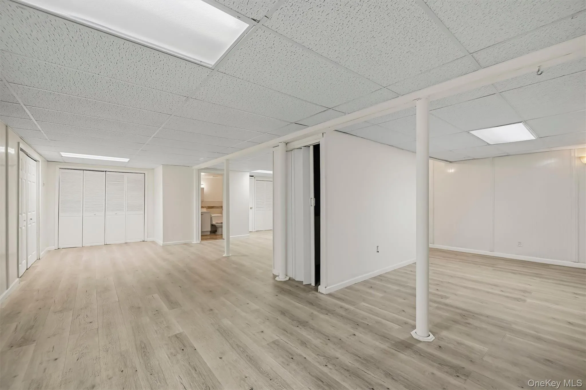 A sprawling finished lower level with the flexibility for a home theater, gym, recreation space, office—or a combination of them. A sprawling finished lower level with the flexibility for a home theater, gym, recreation space, office—or a combination of them.
