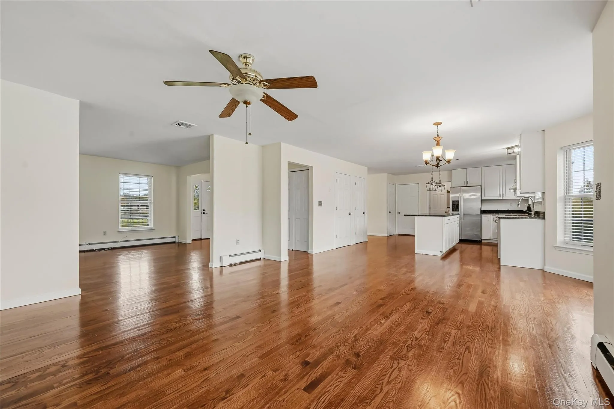 The main level flows effortlessly from one space to the next, with hardwood floors tying everything together. The main level flows effortlessly from one space to the next, with hardwood floors tying everything together.