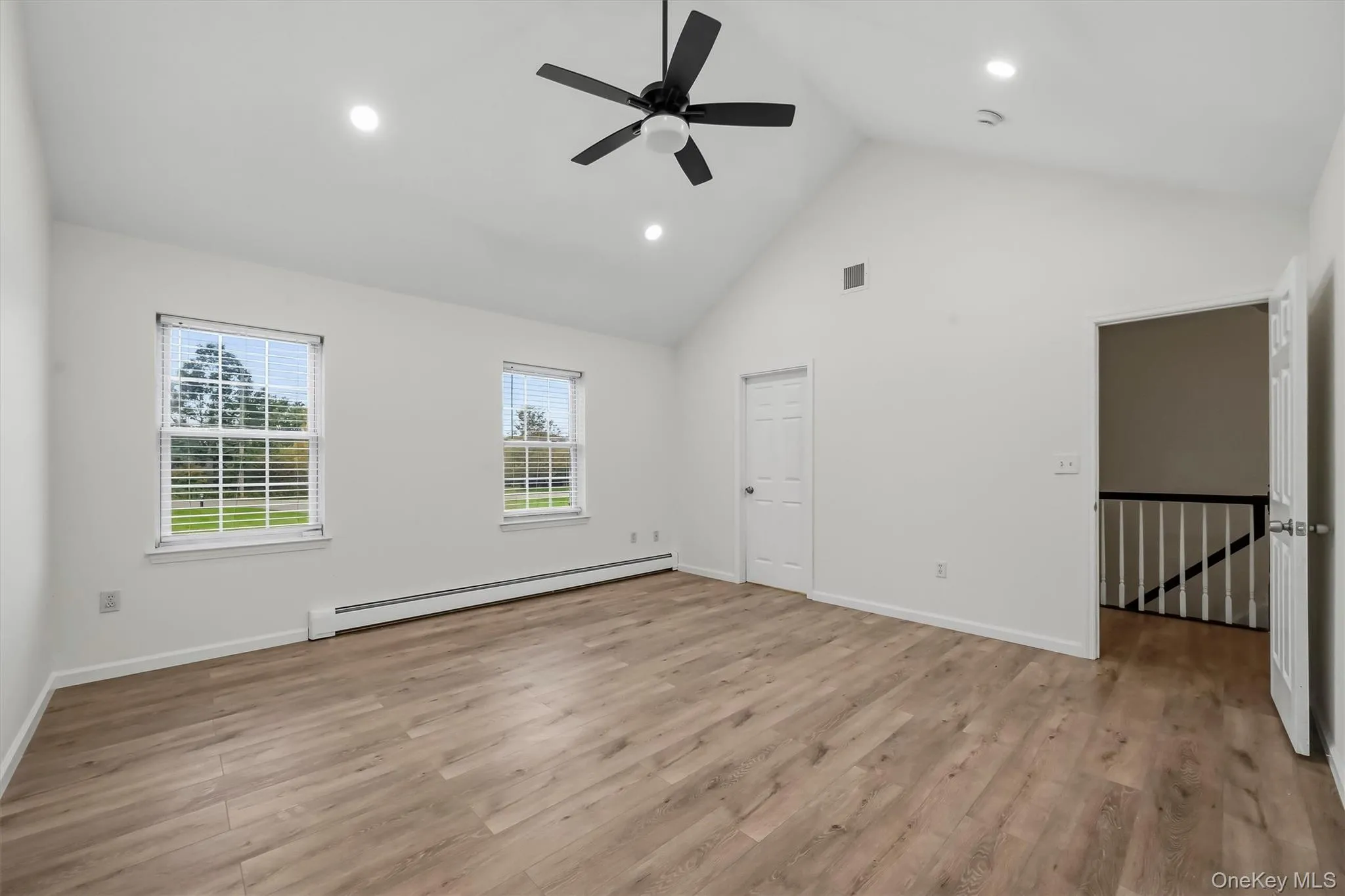 Features a walk in closet, vaulted ceilings, recessed lighting, and plenty of natural light. Features a walk in closet, vaulted ceilings, recessed lighting, and plenty of natural light.