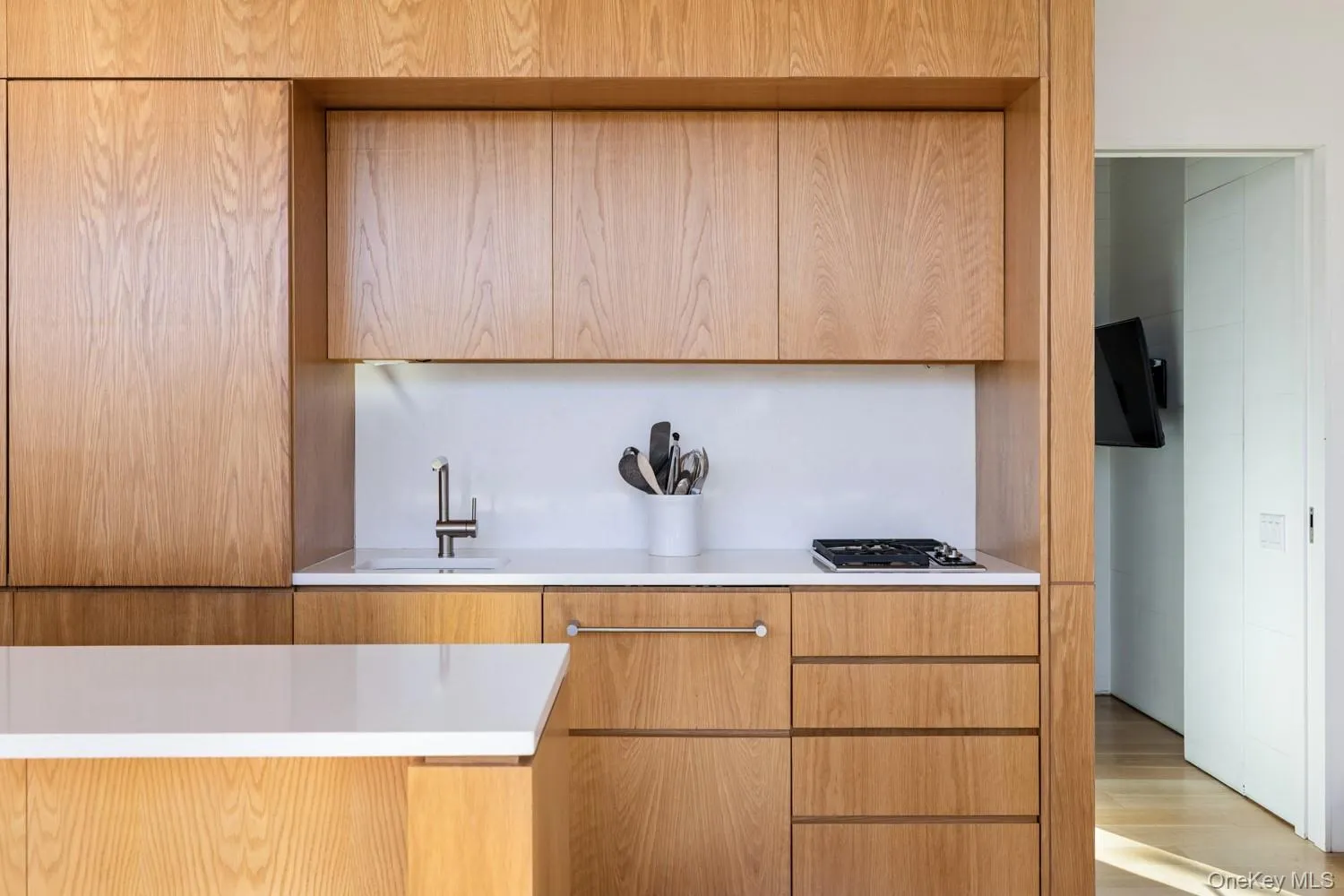 Kitchen with Gas Cooktop and Wood Cabinets Kitchen with Gas Cooktop and Wood Cabinets