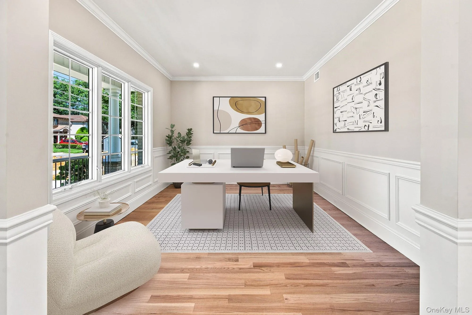 Flexible space: office, study, den, playroom. Wood-finish flooring, white paneled wainscoting, crown molding, recessed lighting, and multiple windows bringing wonderful natural lighting.VIRTUAL STAGING. Flexible space: office, study, den, playroom. Wood-finish flooring, white paneled wainscoting, crown molding, recessed lighting, and multiple windows bringing wonderful natural lighting.VIRTUAL STAGING.