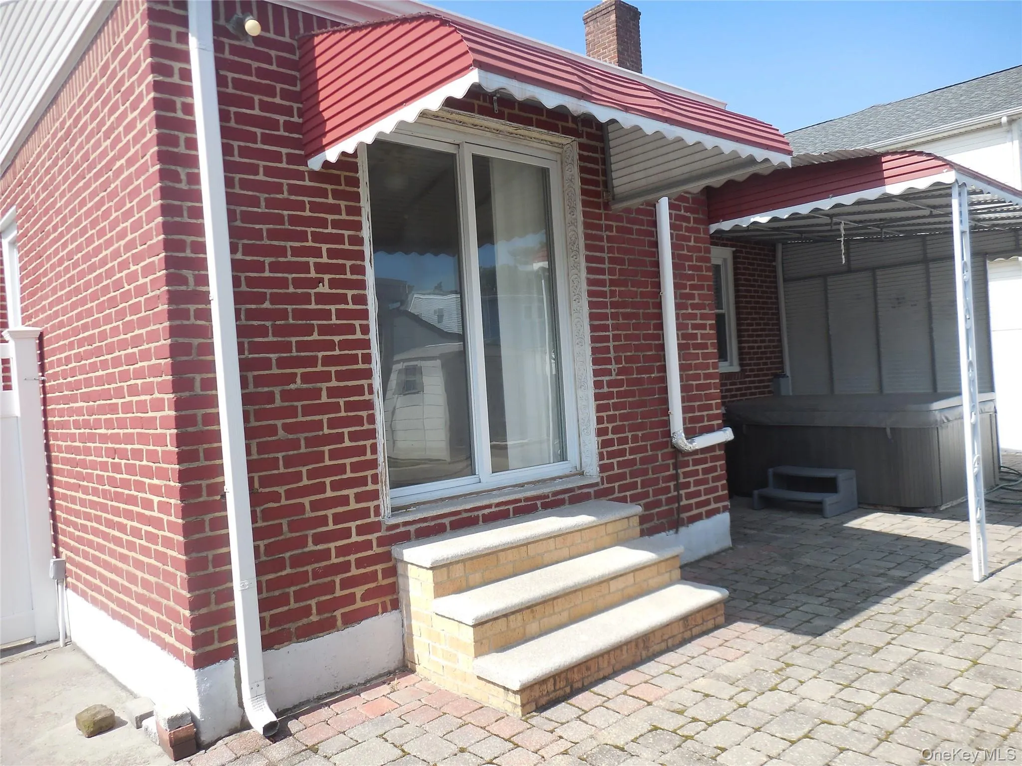 Sliders from kitchen to rear yard Sliders from kitchen to rear yard
