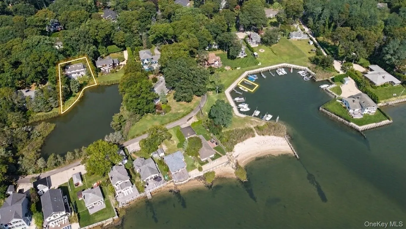 Aerial view of the waterfront property, boat slip, private beach, marina Aerial view of the waterfront property, boat slip, private beach, marina