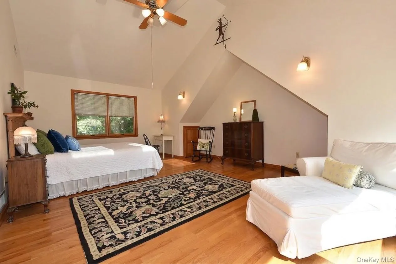 Primary Bedroom with vaulted ceiling, waterviews and 3 closets Primary Bedroom with vaulted ceiling, waterviews and 3 closets