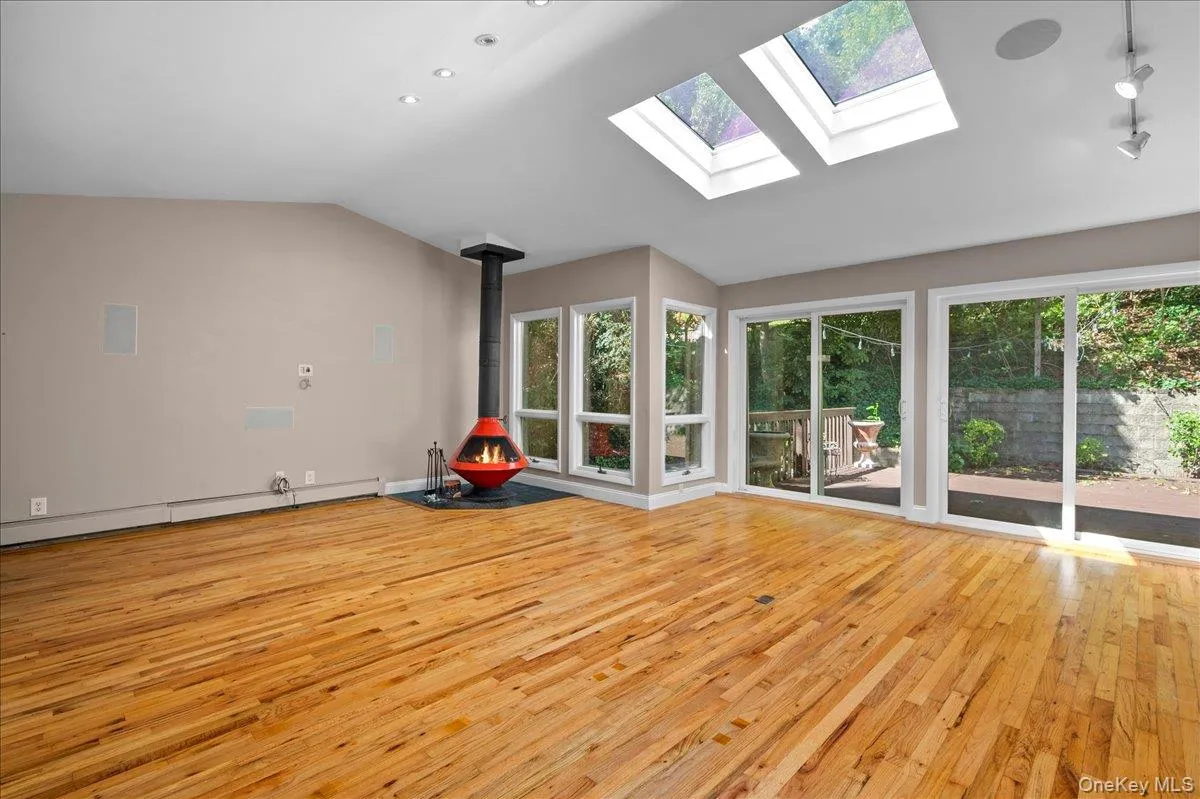 Vaulted Ceilings and Wood Burning stove in the Family Room Vaulted Ceilings and Wood Burning stove in the Family Room