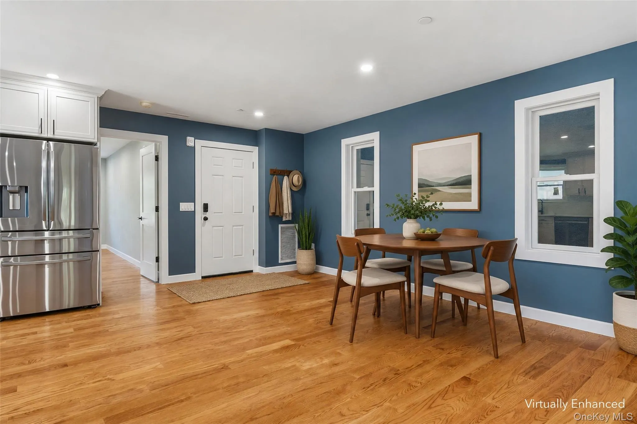 Plenty of room for a 4-person table, or go larger with a long 6-8 seat table! (Virtually Staged) Plenty of room for a 4-person table, or go larger with a long 6-8 seat table! (Virtually Staged)