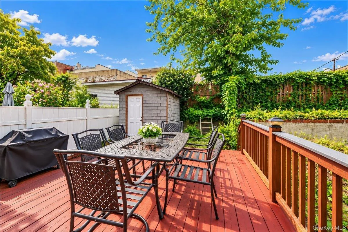 Rear deck, garden and storage shed Rear deck, garden and storage shed