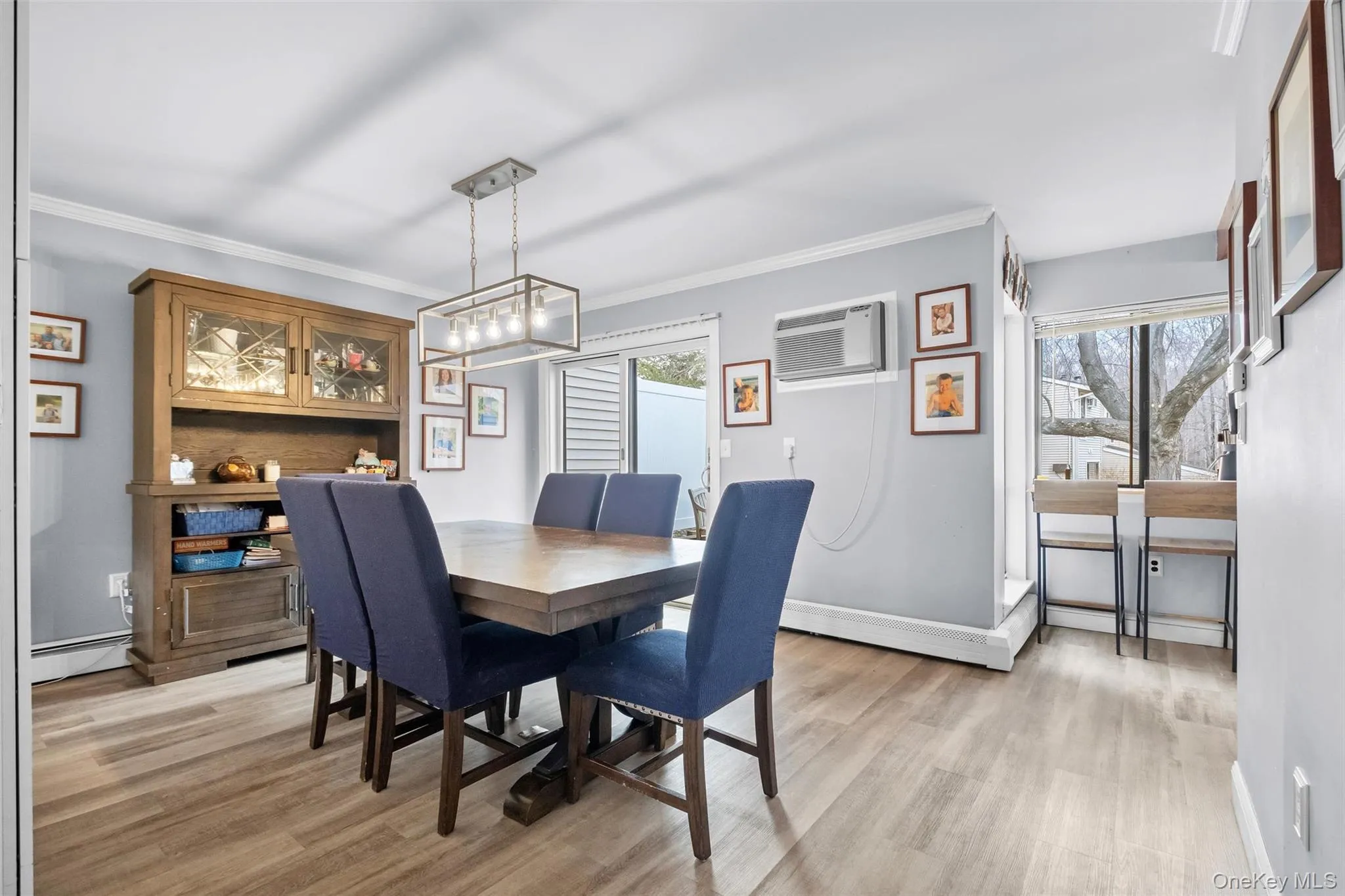 Dining area with sliding door to spacious patio Dining area with sliding door to spacious patio
