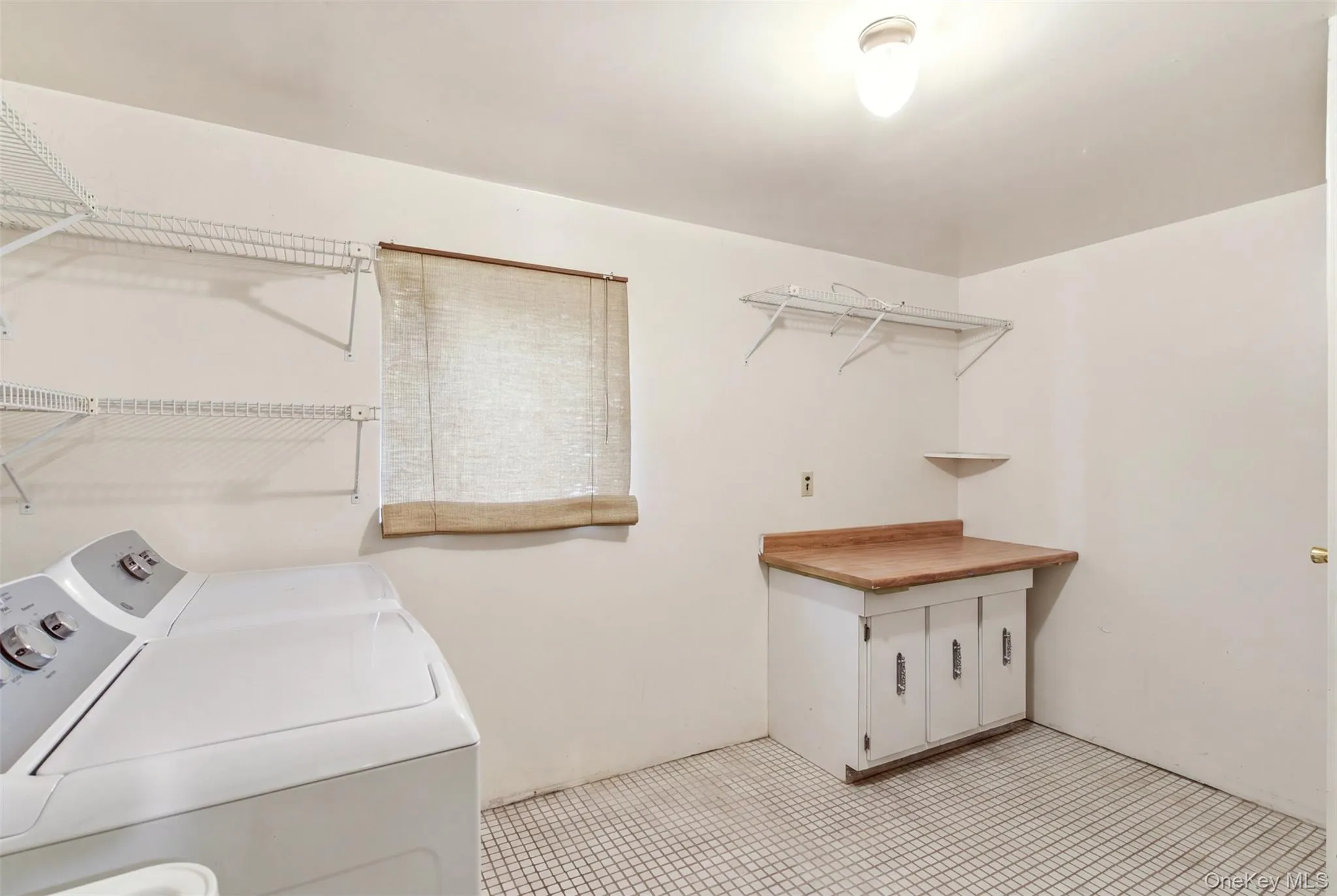 Spacious Laundry Room With New Washer and Dryer Spacious Laundry Room With New Washer and Dryer