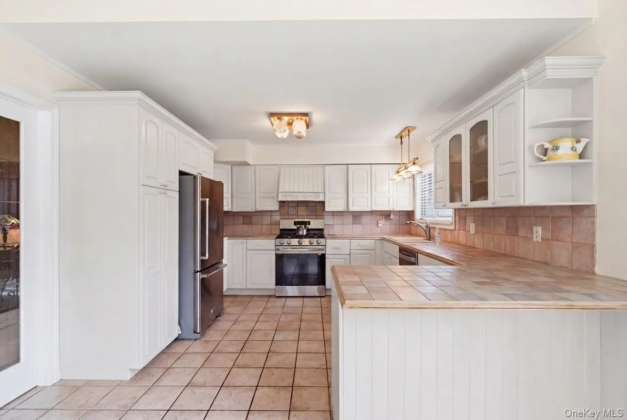 Enhanced with white cabinets Enhanced with white cabinets