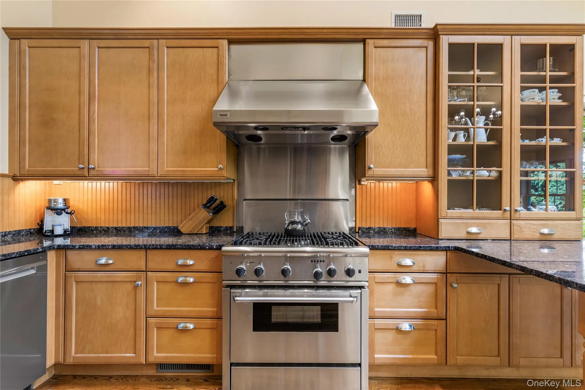 Updated, expansive, granite countertops, custom cabinetry Updated, expansive, granite countertops, custom cabinetry