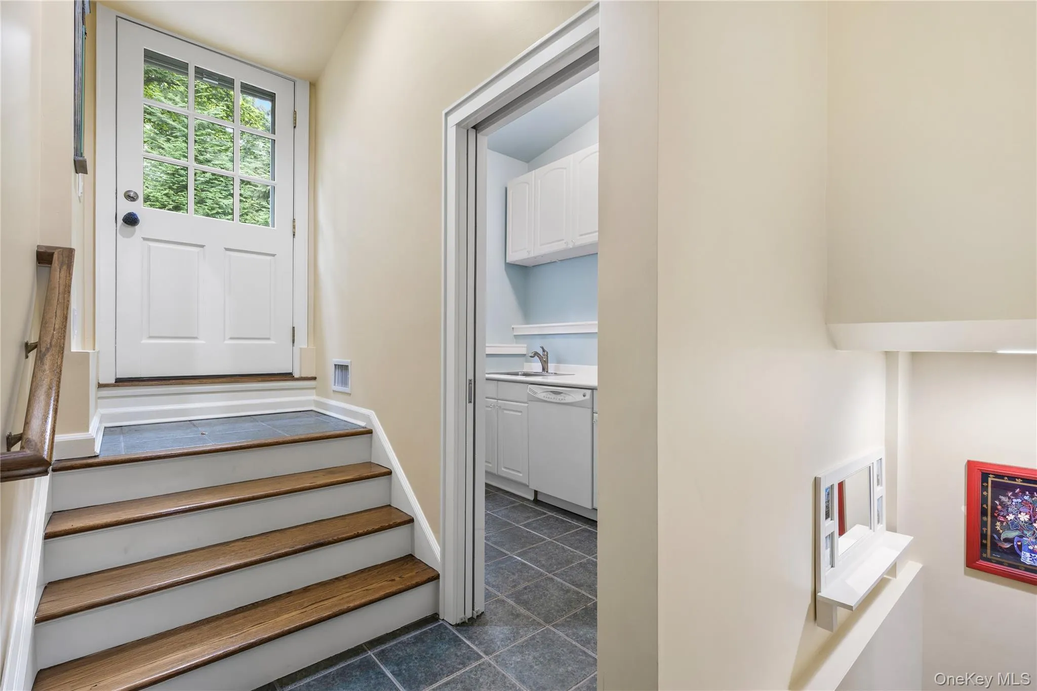 Landing provides access to laundry room, garage, rear yard, rec room and 4th BR Landing provides access to laundry room, garage, rear yard, rec room and 4th BR