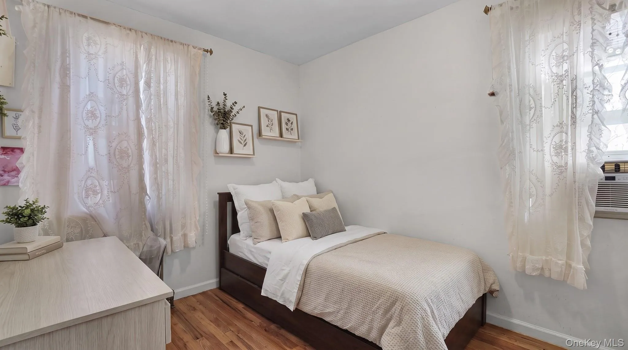 Wood-finish flooring with white painted walls Wood-finish flooring with white painted walls