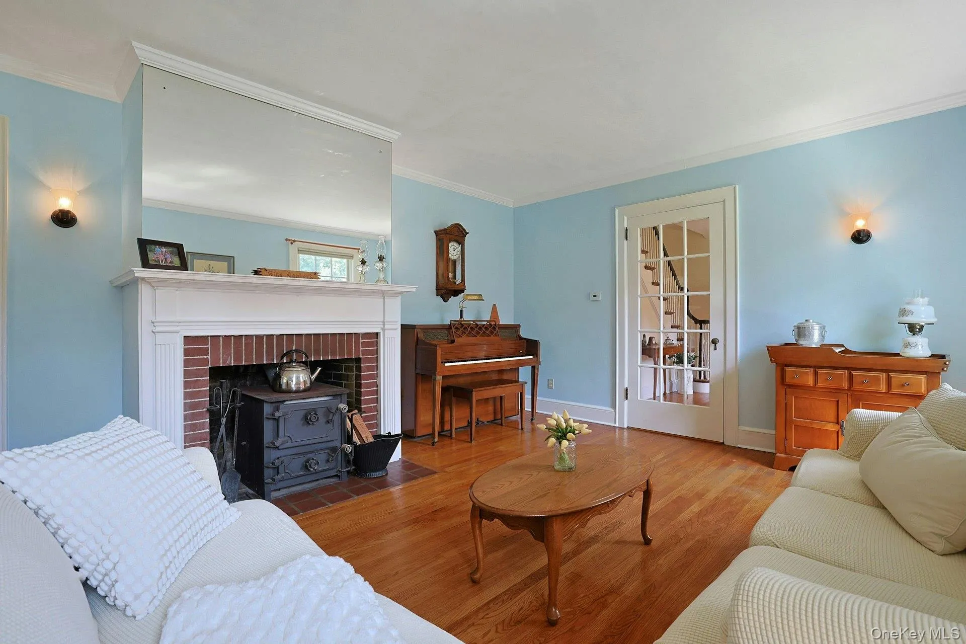 Formal living room with French door and fireplace with wood burning stove insert, Formal living room with French door and fireplace with wood burning stove insert,