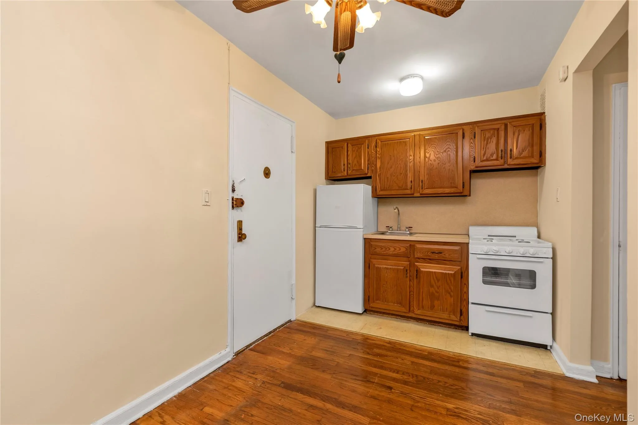 Kitchen with new refrigerator and new stove Kitchen with new refrigerator and new stove
