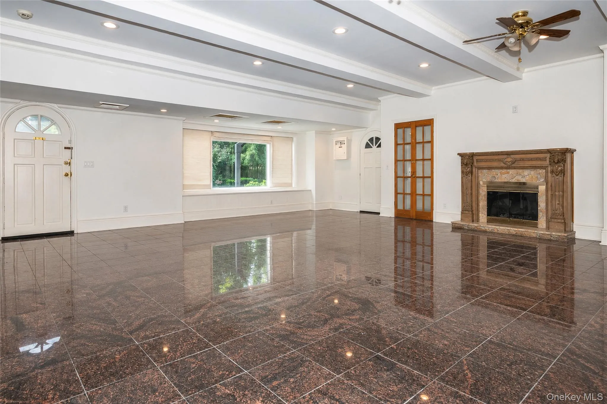 1300 sq ft of additional living space with fireplace and walk out to back yard and garage. AI Generated 1300 sq ft of additional living space with fireplace and walk out to back yard and garage. AI Generated