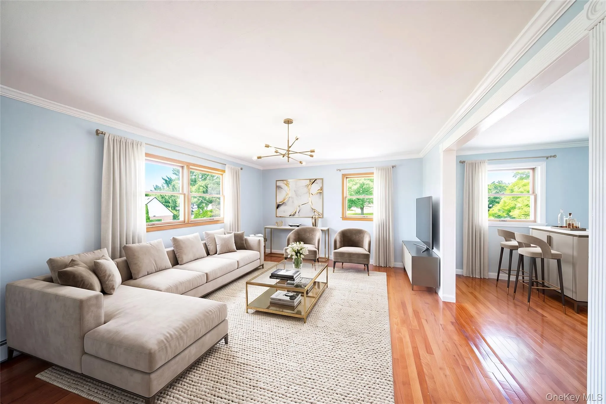 Hardwood flooring, crown molding, double-pane windows, and a built-in bar Hardwood flooring, crown molding, double-pane windows, and a built-in bar