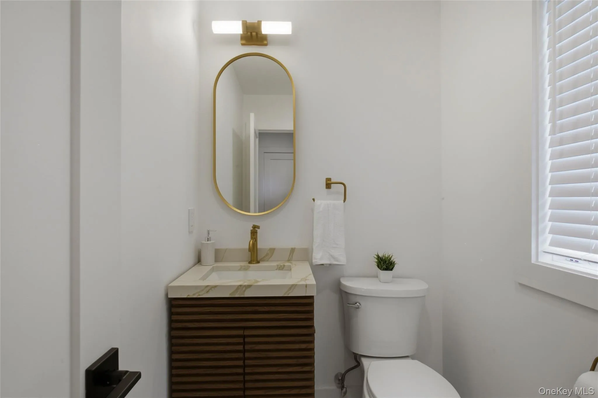Main level powder room. Main level powder room.