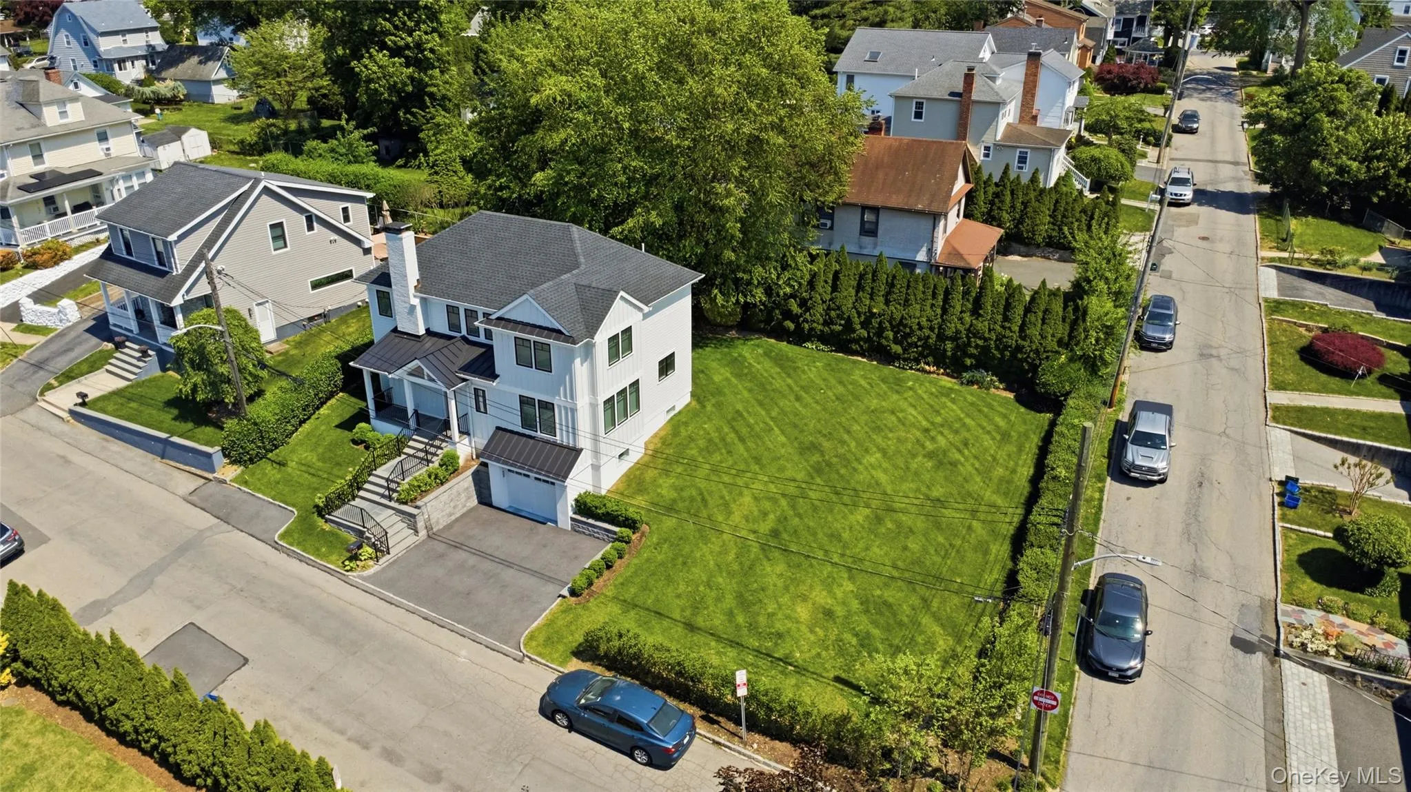 Modern farmhouse set on spacious 9,369 sq ft corner double lot. Modern farmhouse set on spacious 9,369 sq ft corner double lot.