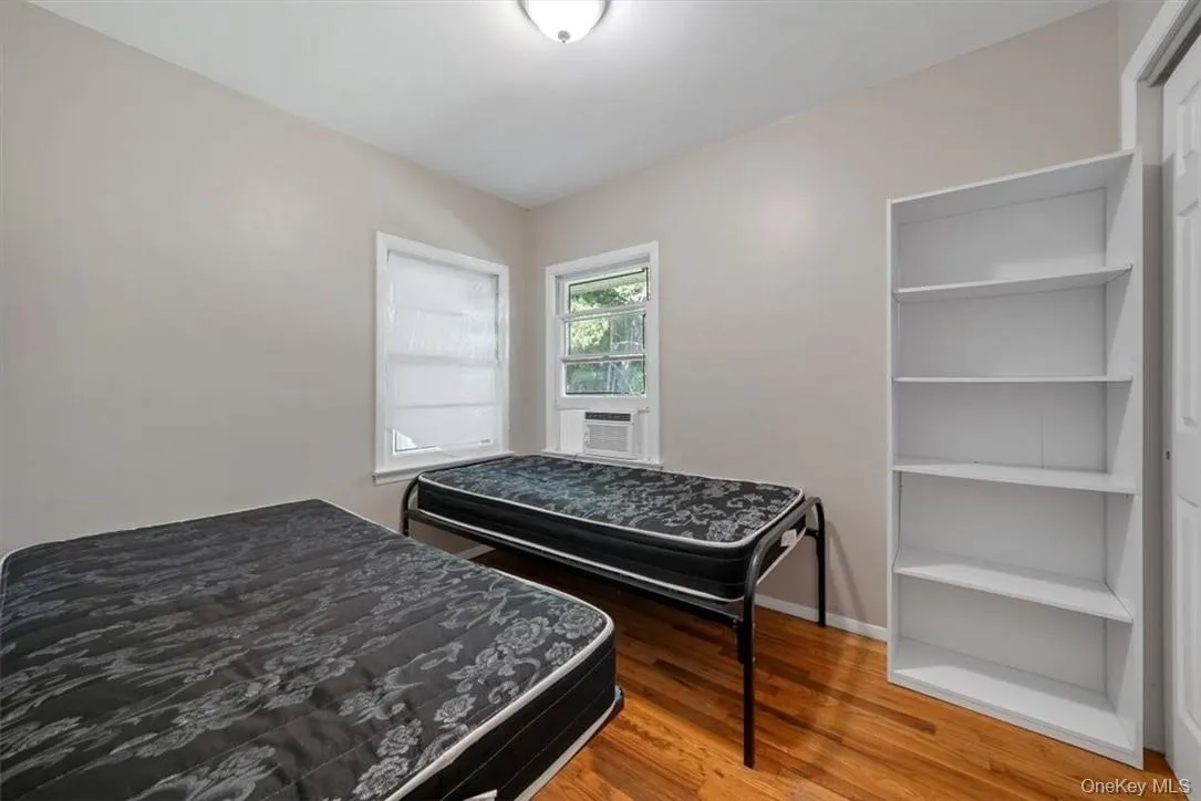 Bedroom 2 with hardwood / wood-style flooring Bedroom 2 with hardwood / wood-style flooring