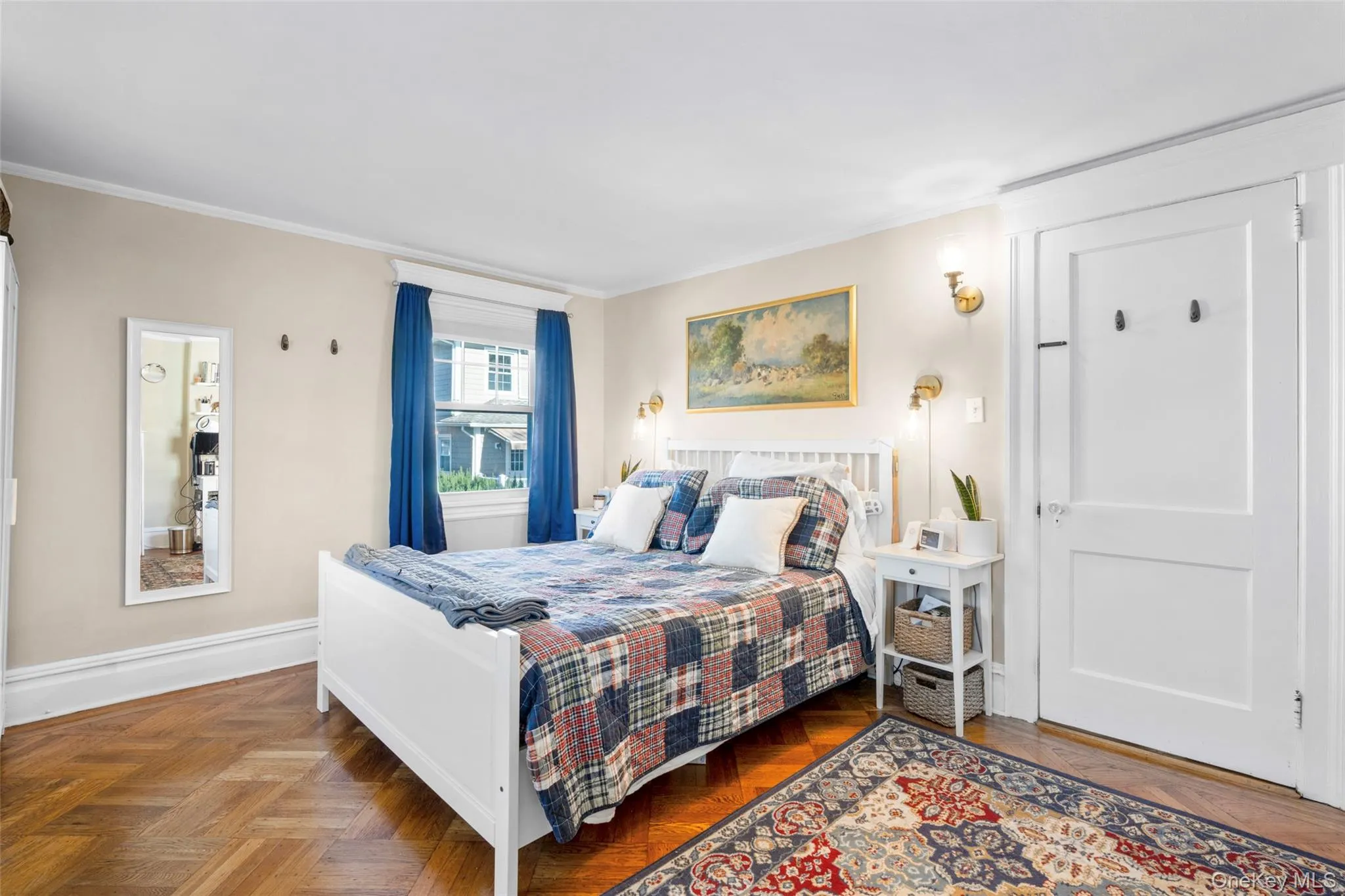Bedroom with parquet flooring and crown molding Bedroom with parquet flooring and crown molding