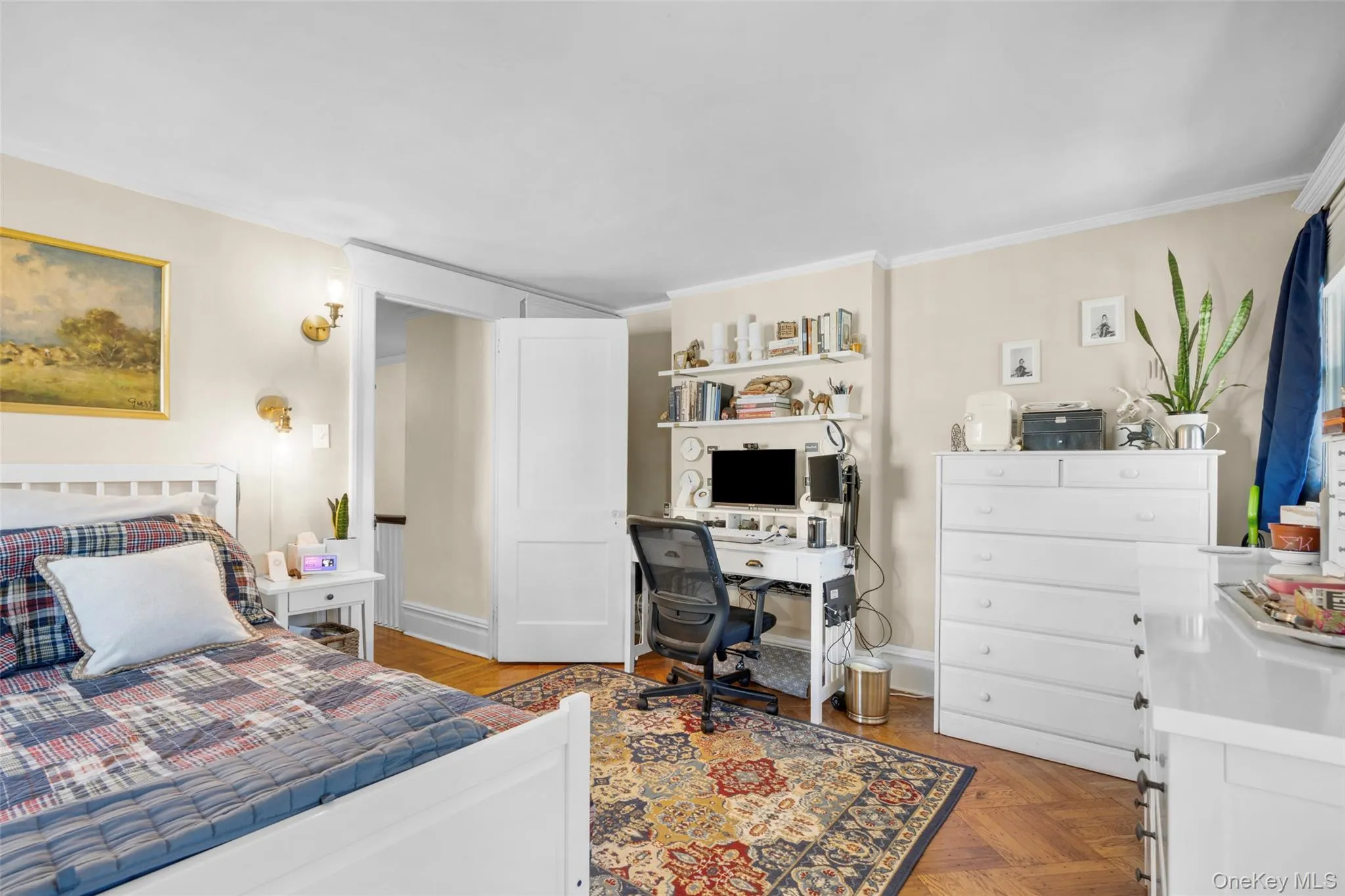 Bedroom with parquet floors and crown molding Bedroom with parquet floors and crown molding