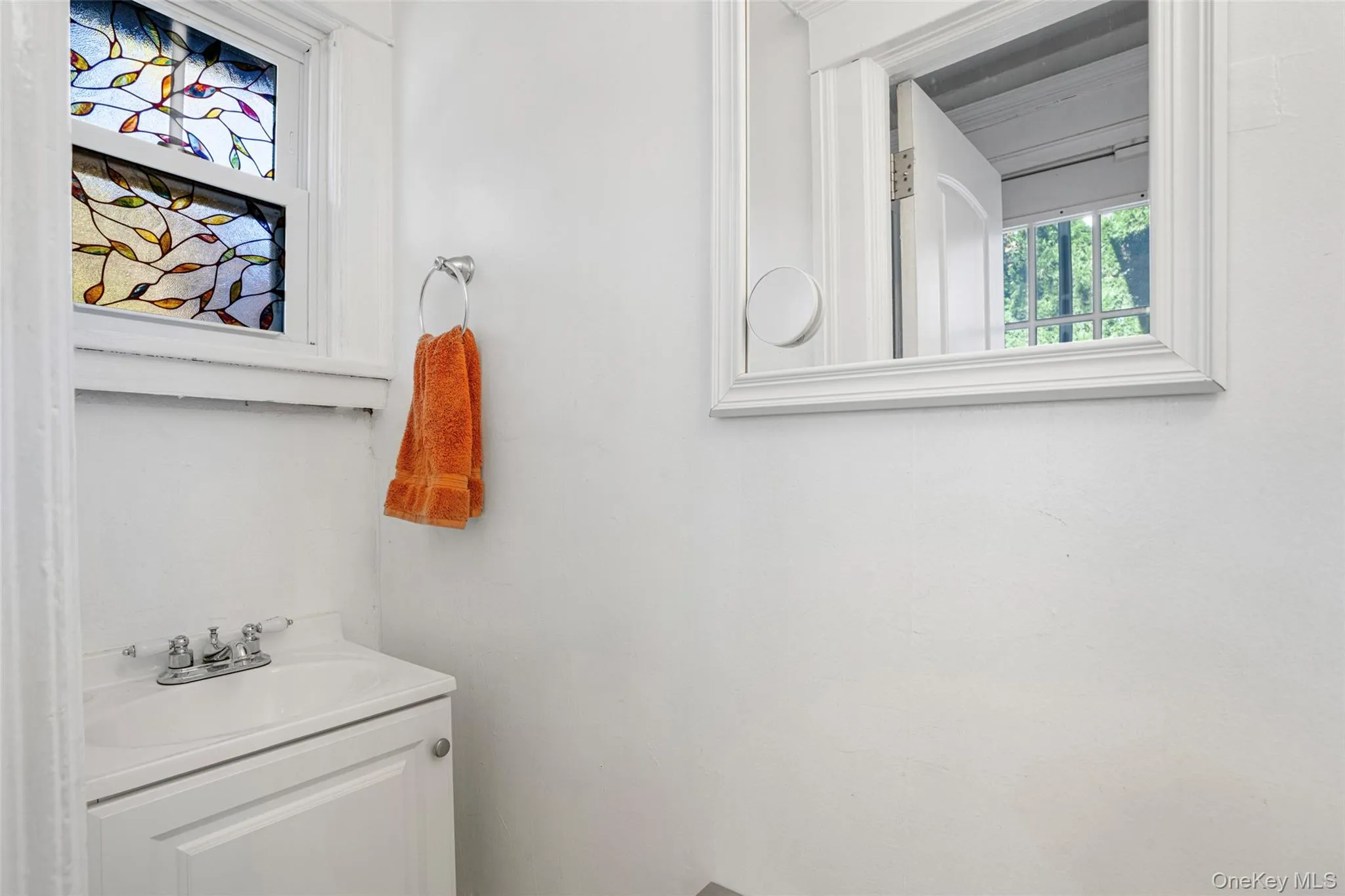 Bathroom featuring vanity Bathroom featuring vanity