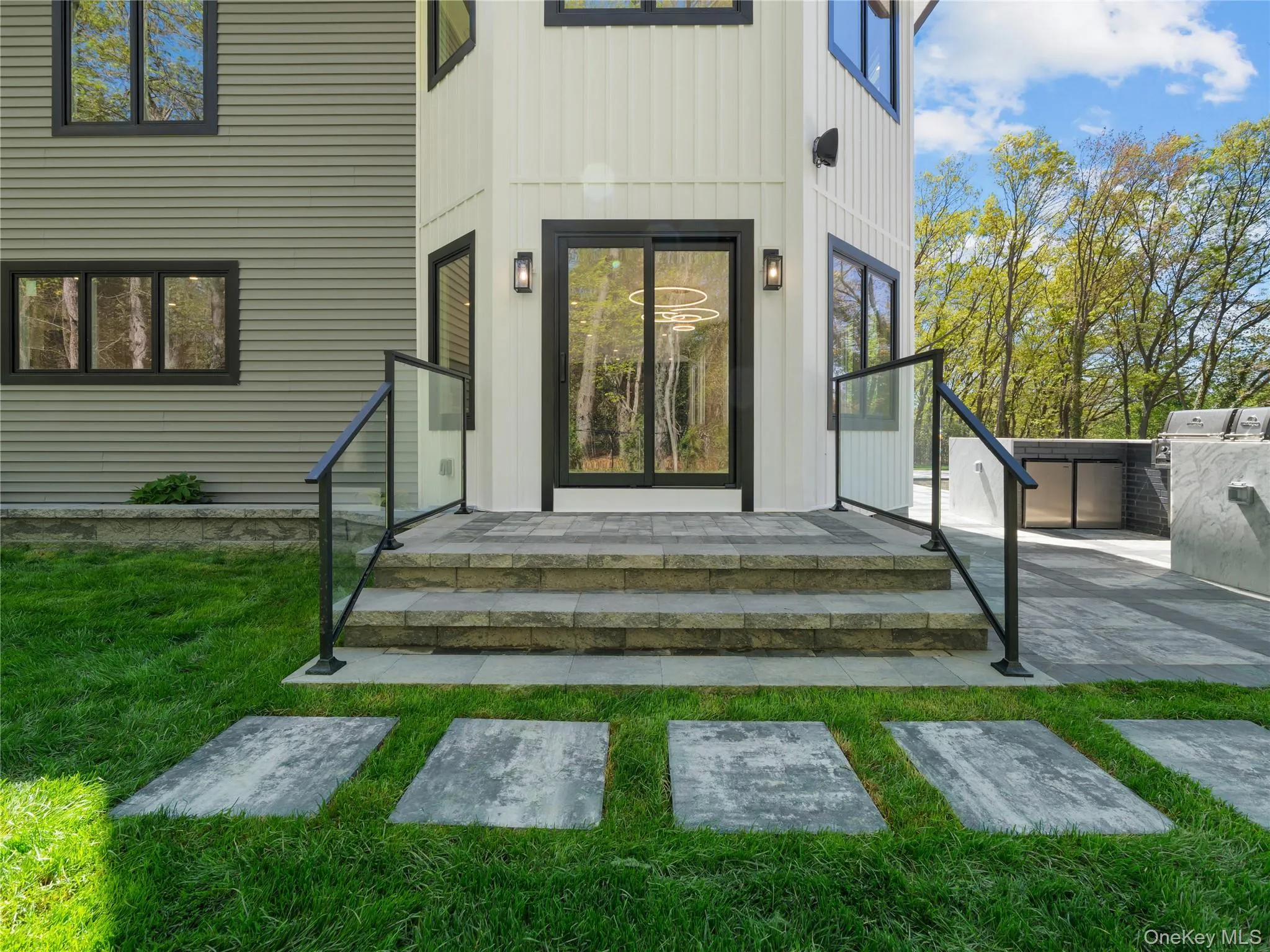 Entrance to property with board and batten siding Entrance to property with board and batten siding