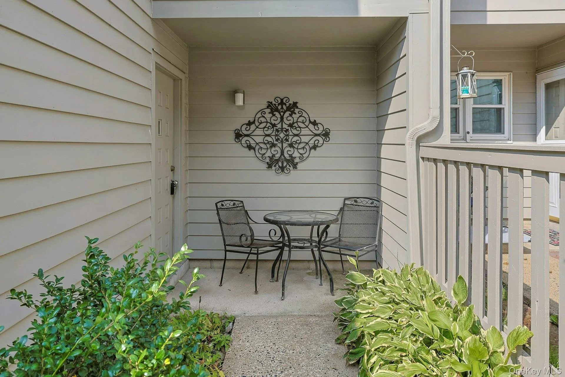 Past the driveway, with two parking spaces and private garage, open the gate to the fenced in and beautifully planted main entrance. You could pause for a minute and sit on the patio, watching the squirrels skip across your fence. Past the driveway, with two parking spaces and private garage, open the gate to the fenced in and beautifully planted main entrance. You could pause for a minute and sit on the patio, watching the squirrels skip across your fence.