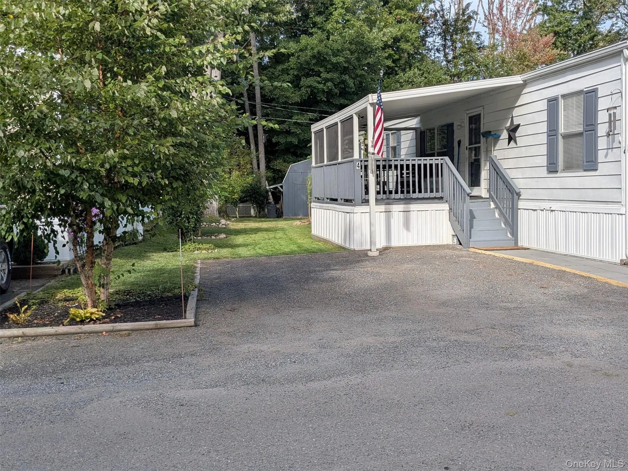 Concrete paved walkway to home Concrete paved walkway to home