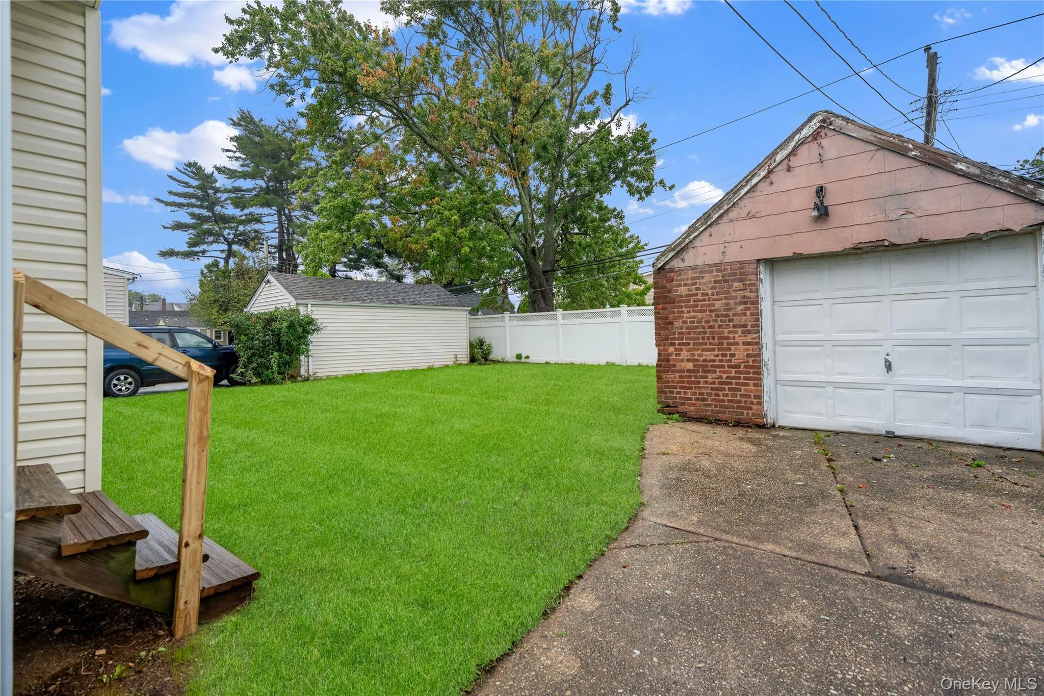 ...which leads to the detached 1-car garage ...which leads to the detached 1-car garage