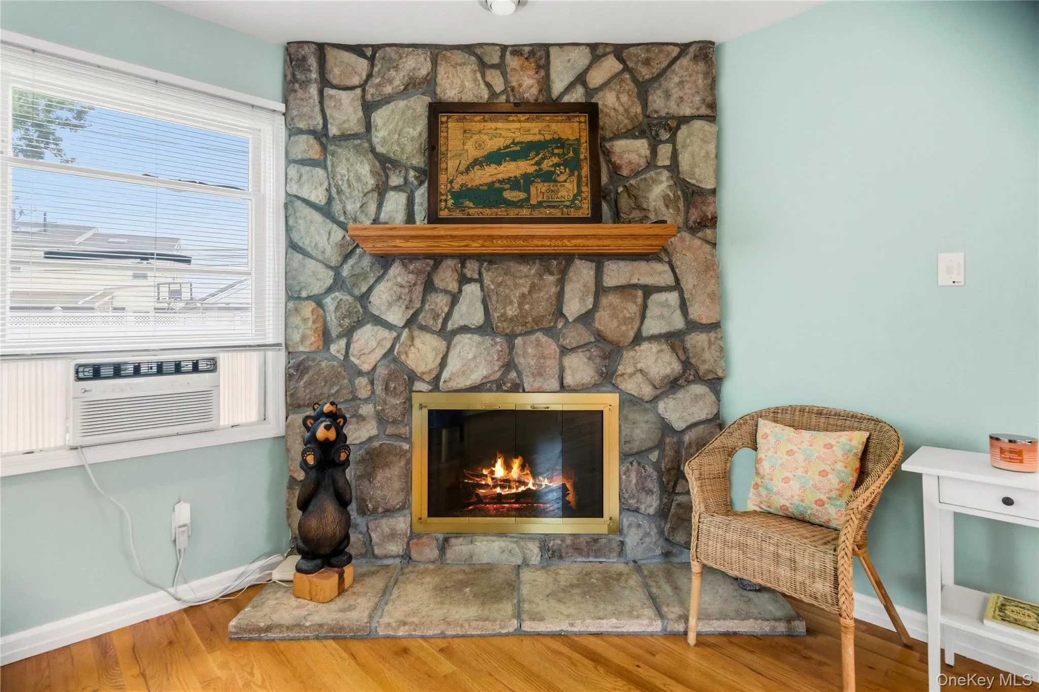 The stone faced fireplace is fueled by natural gas for immediate and maintenance free enjoyment. The stone faced fireplace is fueled by natural gas for immediate and maintenance free enjoyment.