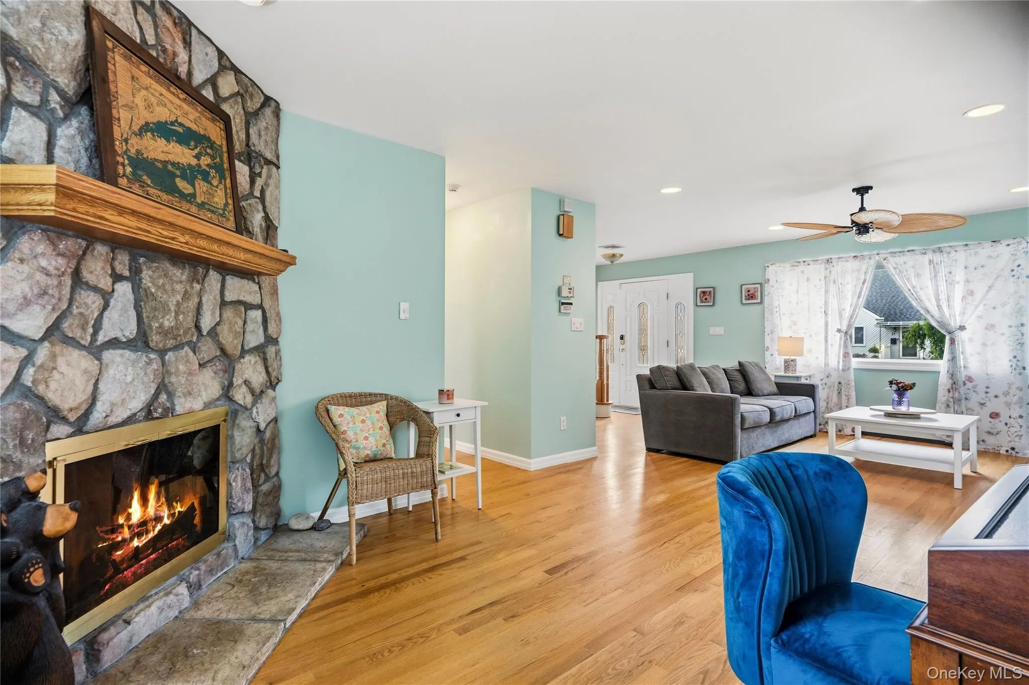 Off the living room is a rear hallway where you will find the downstairs bathroom, access to the full basement and the kitchen. Off the living room is a rear hallway where you will find the downstairs bathroom, access to the full basement and the kitchen.