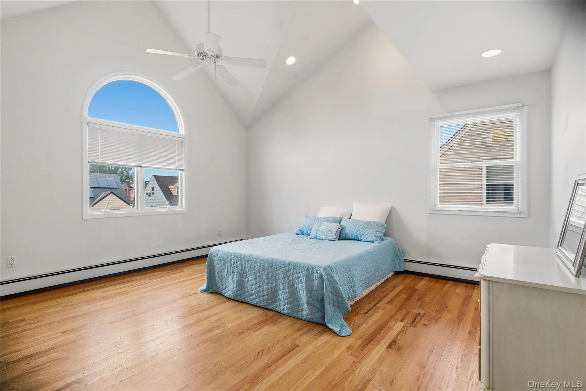 On the 2nd floor is the large primary bedroom with hardwood floors and vaulted ceiling. On the 2nd floor is the large primary bedroom with hardwood floors and vaulted ceiling.