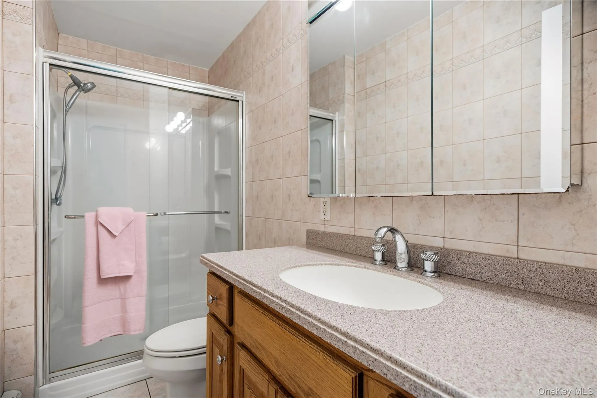 Off the kitchen and living room areas is the 1st floor, full bathroom, with a stall. shower. Off the kitchen and living room areas is the 1st floor, full bathroom, with a stall. shower.