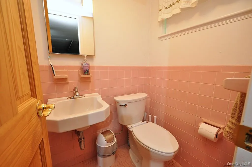 lower level half bath. lower level half bath.
