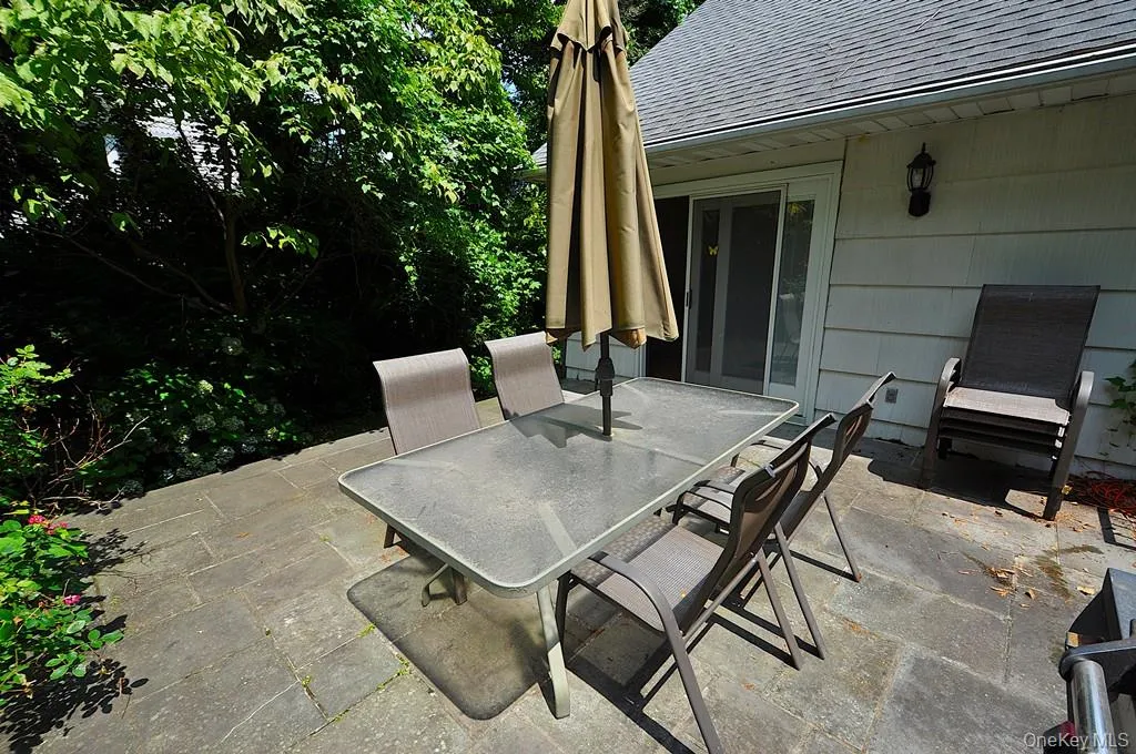 Patio is just off the dining room. Patio is just off the dining room.