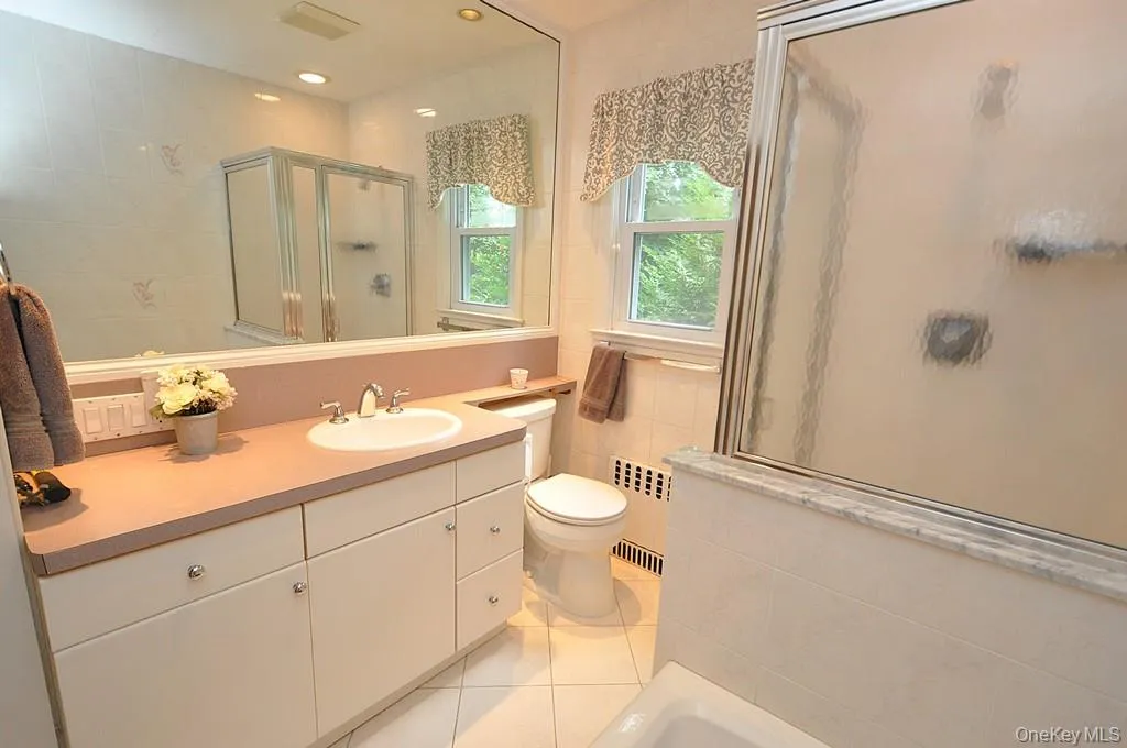 Hall Bath with standing shower and separate tub Hall Bath with standing shower and separate tub