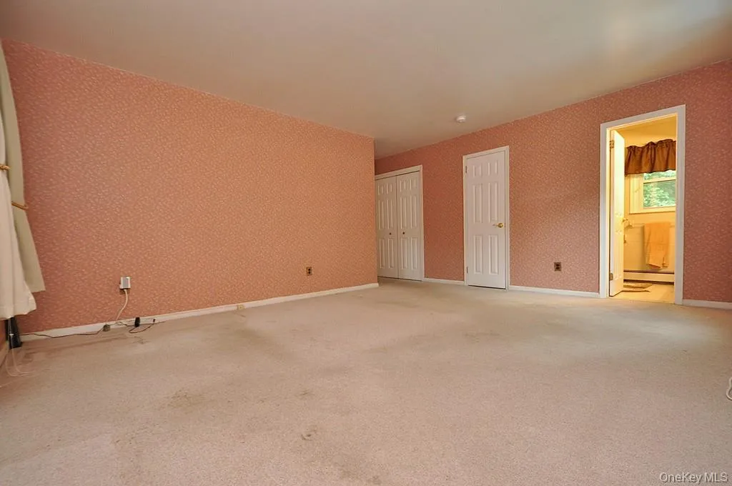 Large Primary Bedroom has wall to wall carpeting, two large closet and a private bath. The room is approx. 16'-6" x 16'-2". Large Primary Bedroom has wall to wall carpeting, two large closet and a private bath. The room is approx. 16'-6" x 16'-2".