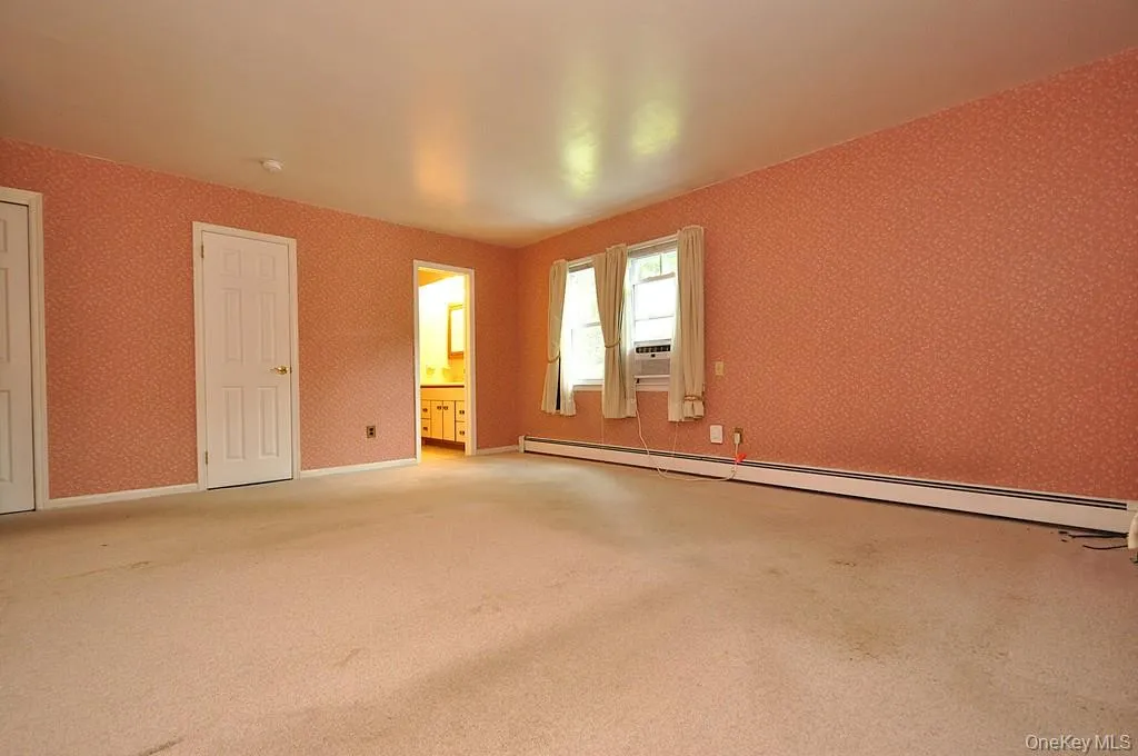 Large Primary Bedroom has wall to wall carpeting, two large closet and a private bath. The room is approx. 16'-6" x 16'-2". Large Primary Bedroom has wall to wall carpeting, two large closet and a private bath. The room is approx. 16'-6" x 16'-2".