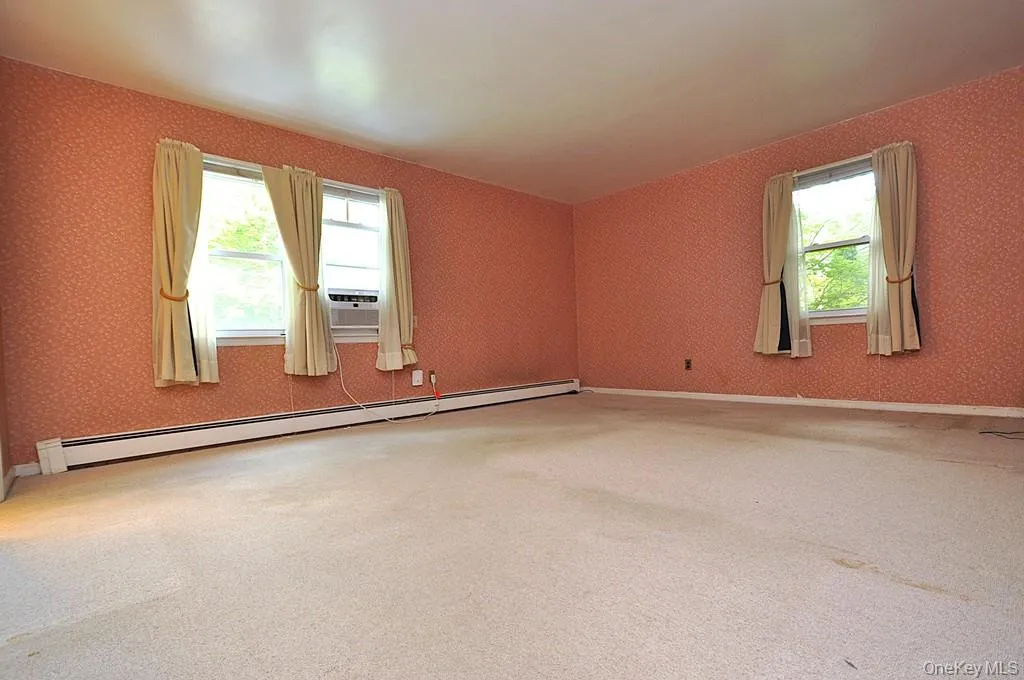 Large Primary Bedroom has wall to wall carpeting, two large closet and a private bath. The room is approx. 16'-6" x 16'-2". Large Primary Bedroom has wall to wall carpeting, two large closet and a private bath. The room is approx. 16'-6" x 16'-2".