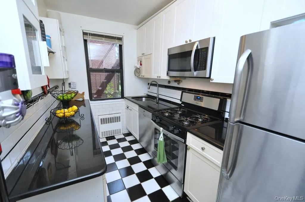Updated kitchen has granite counters and stainless steel appliances. Updated kitchen has granite counters and stainless steel appliances.