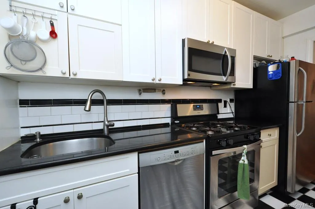 Updated kitchen has granite counters and stainless steel appliances. Updated kitchen has granite counters and stainless steel appliances.