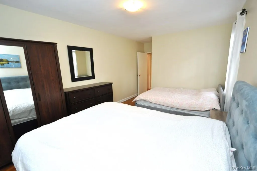 The large corner bedroom has parquet floors. The large corner bedroom has parquet floors.
