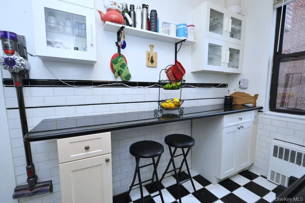 Updated kitchen has granite counters and stainless steel appliances. Updated kitchen has granite counters and stainless steel appliances.