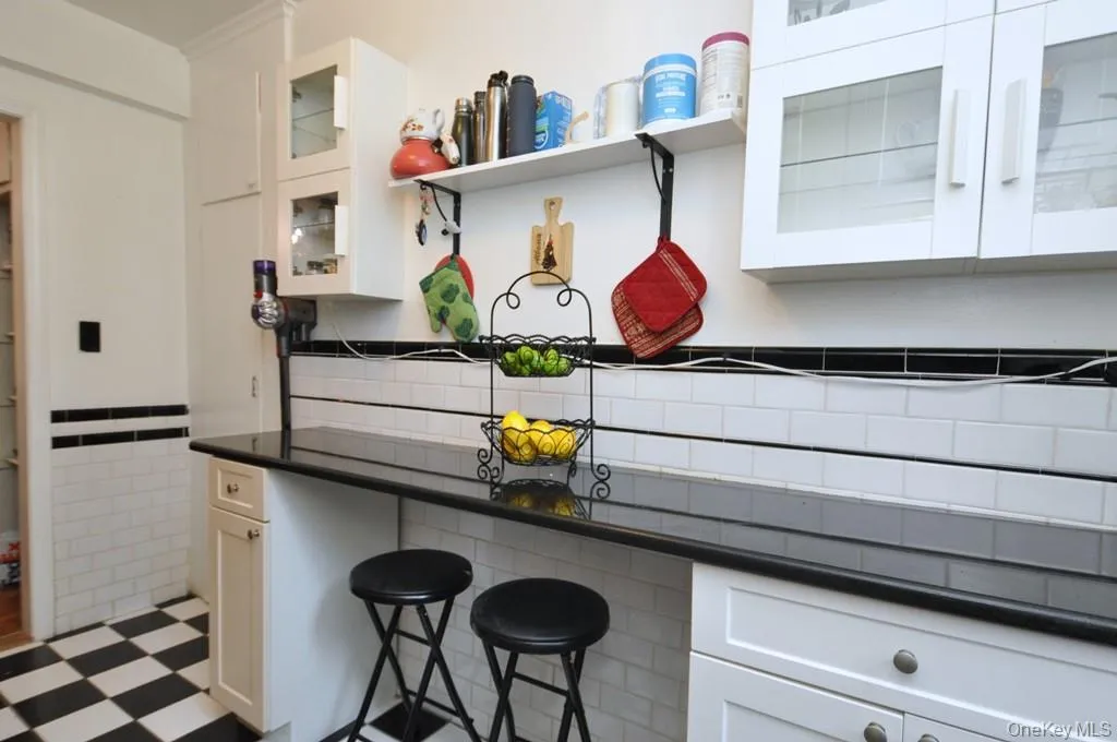 Updated kitchen has granite counters and stainless steel appliances. Updated kitchen has granite counters and stainless steel appliances.