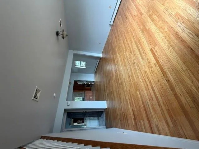 Hardwood flooring throughout the dining and living room Hardwood flooring throughout the dining and living room